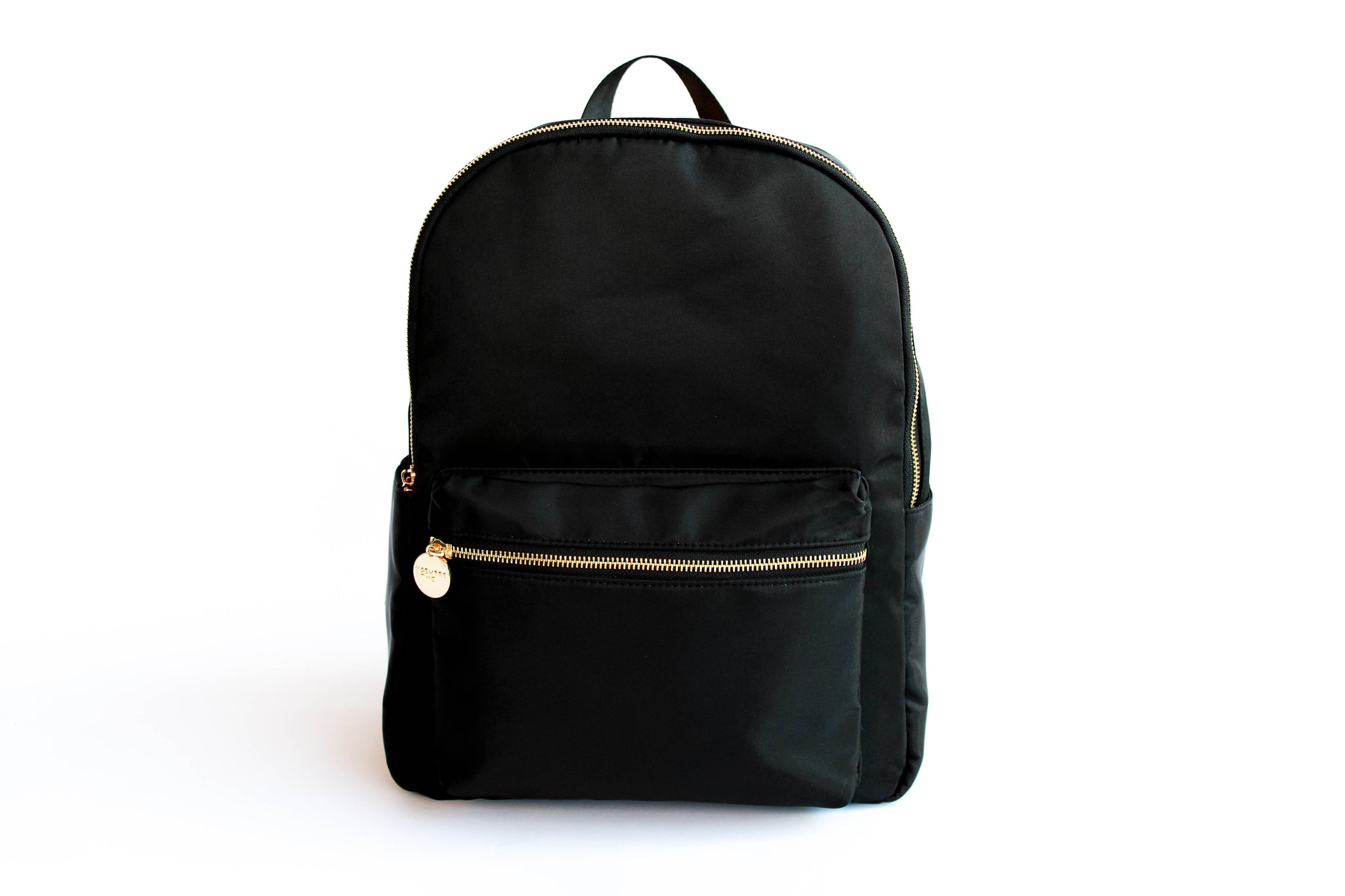 Black backpack fashion with gold zippers